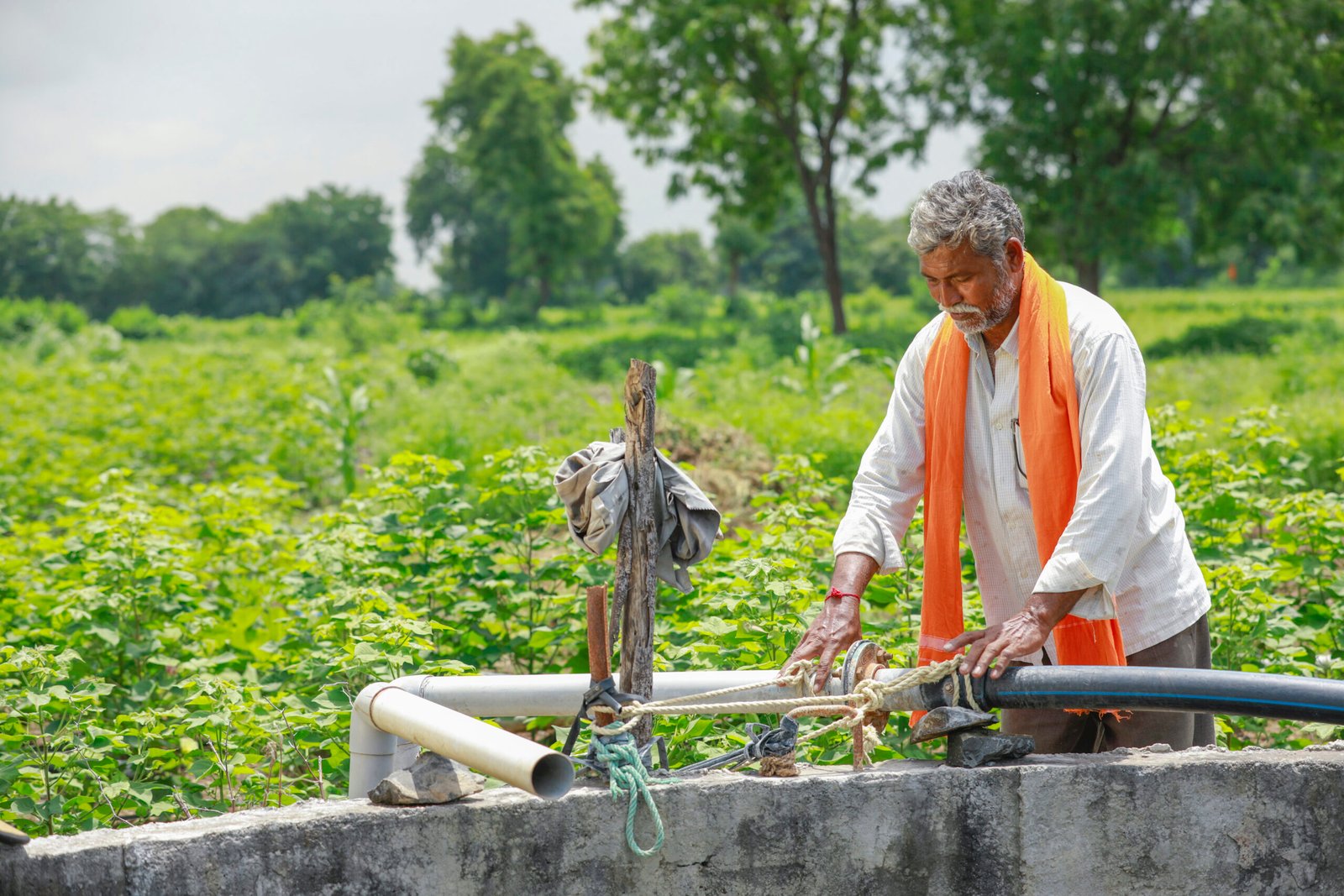 young-indian-farmer-working-field